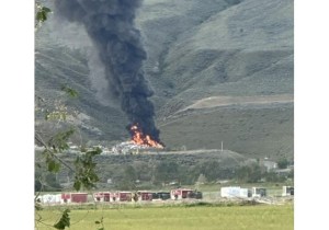 A fire at the base of a mountain.