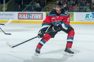 Kelowna Rocket skating mid-game.