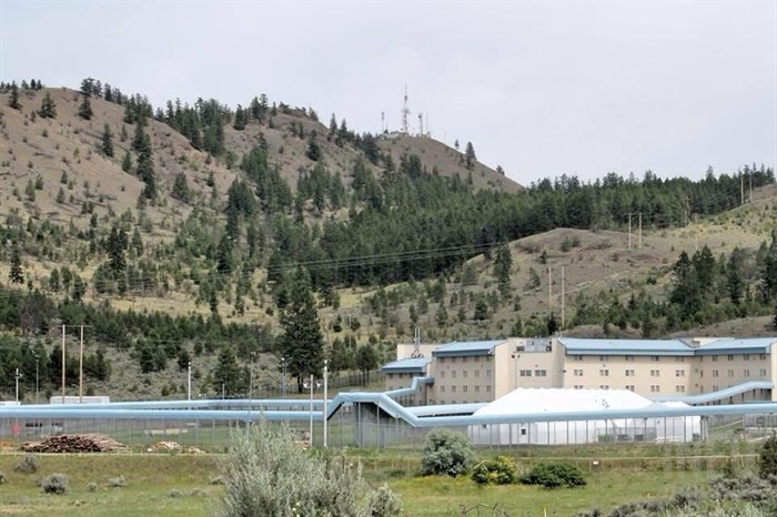 Inspection finds most BC prisons understaffed, lack inmate programming | iNFOnews.ca A jail is backed by towering grassy hills.