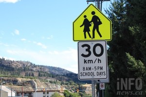 A school speed zone sign.