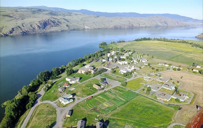 Aerial photo of a riverside community.