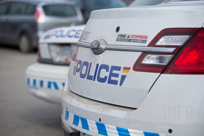 Two parked RCMP patrol cars.