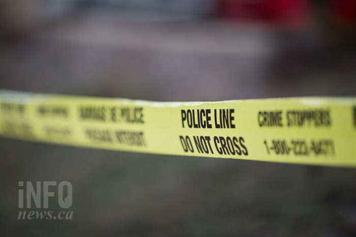 Police tape at a crime scene.