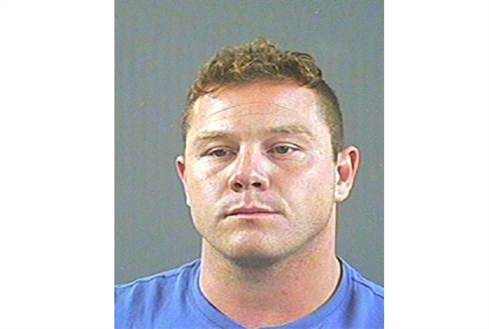 A police-supplied photo of Joel Eric Carlson.