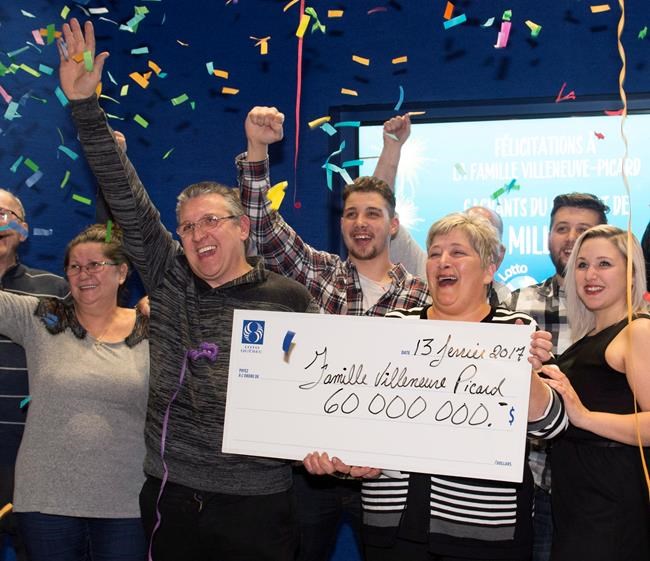Quebec couple pick up $60-million cheque after winning big in lottery | iNFOnews.ca