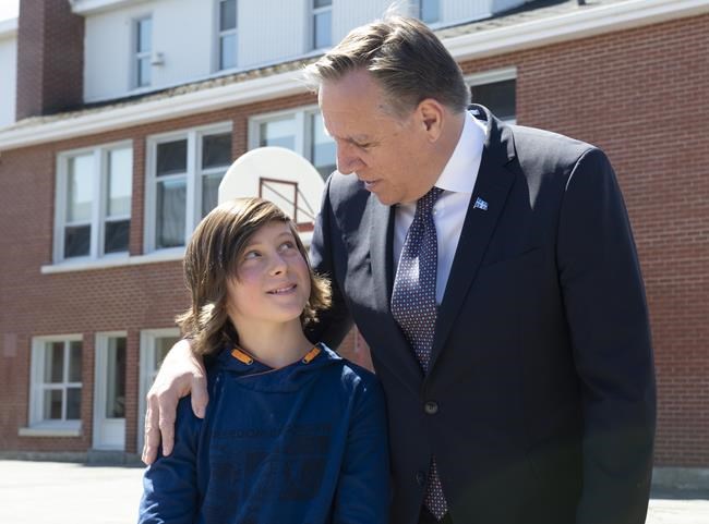 Boy's song inspires Francois Legault to rebuild flooded school in Beauce | iNFOnews.ca Boy's song inspires Francois Legault to rebuild flooded school in Beauce | iNFOnews.ca