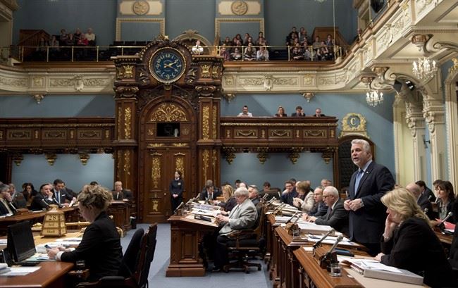 Couillard defends dropping tax credit for company owned by Peladeau fiancee | iNFOnews.ca CP32880380