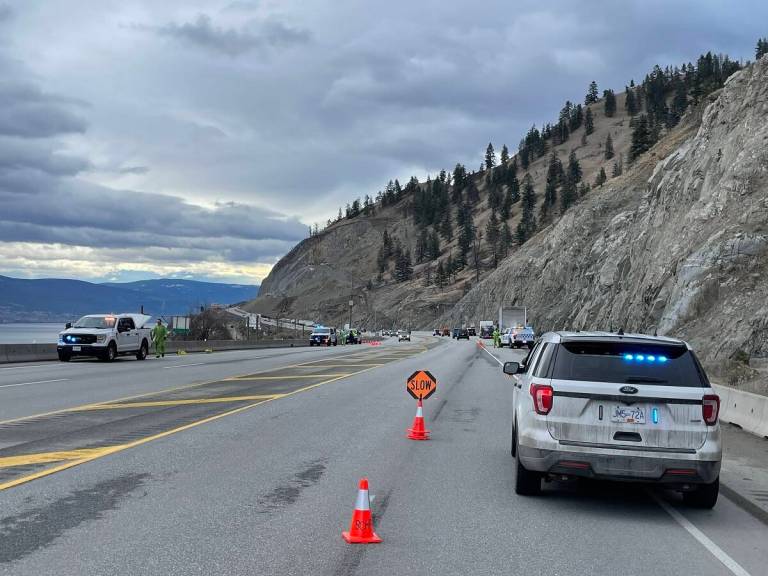 RCMP and CVSE vehicles on Highway 97 near Summerland.