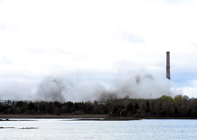 Poof, they're gone: Power plant towers demolished in seconds | iNFOnews.ca