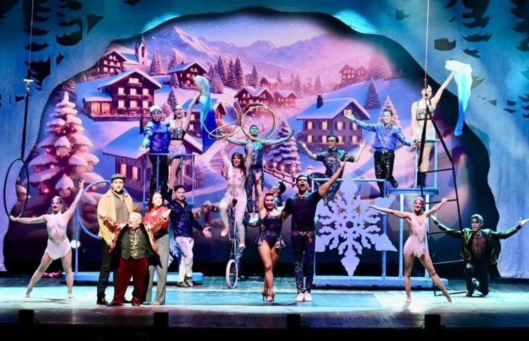 Acrobats perform a winter holiday-themed show.