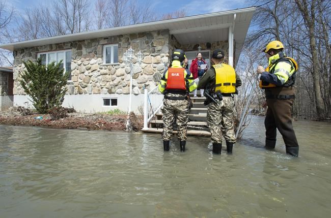 Cut off by water, Quebec island residents determined to stay in their homes | iNFOnews.ca