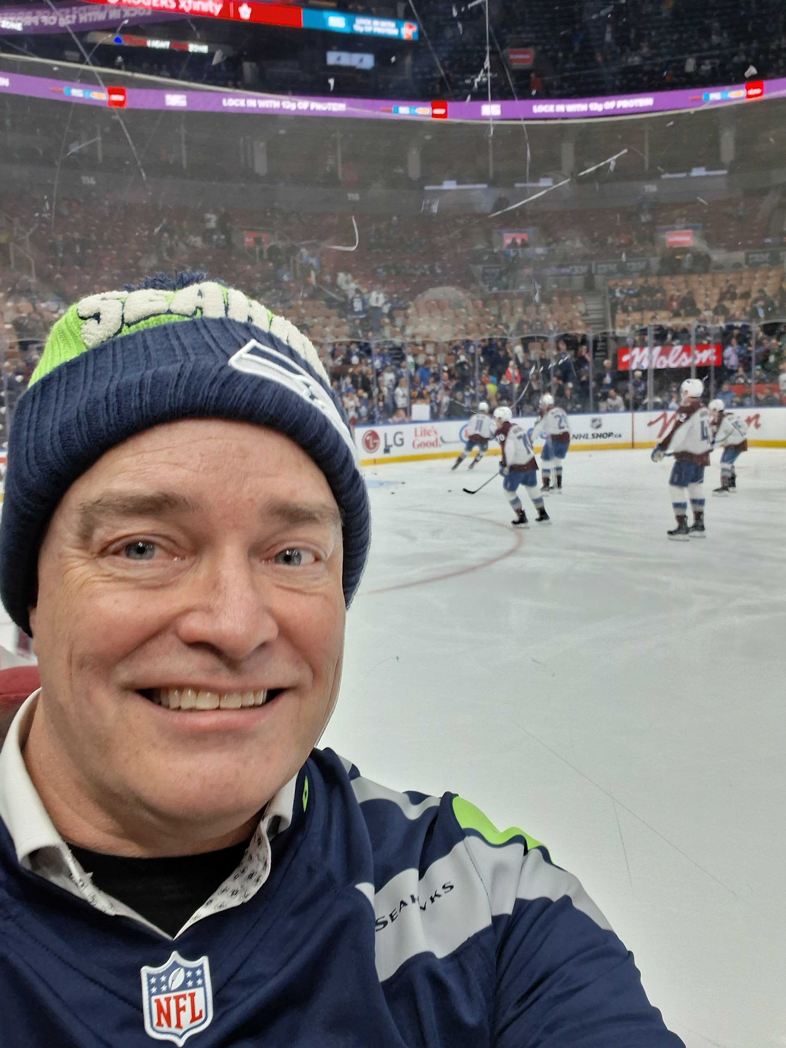 John Patrick Davy takes a selfie at a hocket game.