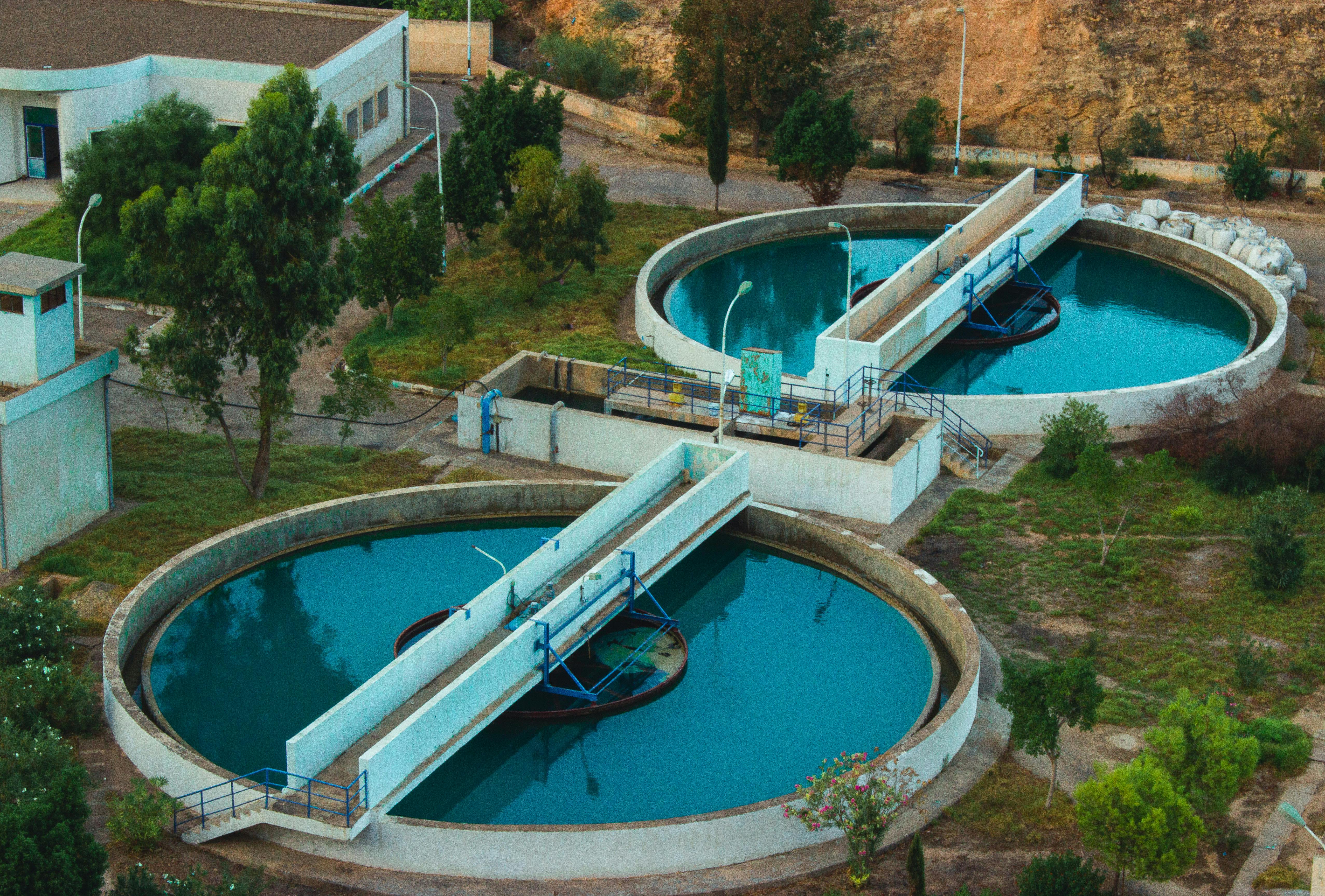Two large pools of water at a water treatment plant.