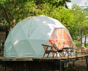 A dome tent and deck.