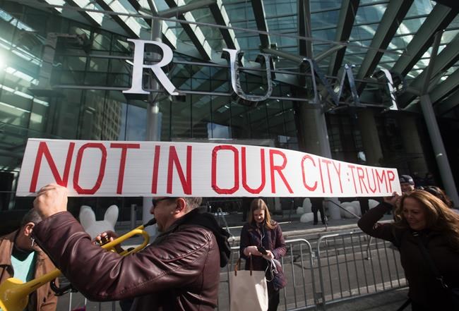 Noisy protest, heated arguments as Trump sons attend hotel opening in Vancouver | iNFOnews.ca